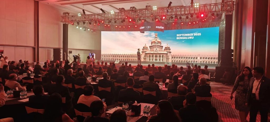 Audience at Kinsfolk event watching a presentation on Bengaluru, September 2025.